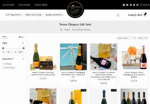 Veuve Clicquot Gift Basket- Wine And Champagne Gifts - When an outstanding occasion requires a champagne toast, treat them with this exquisite spread of gourmet foods and delicious chocolates, together with a bottle of Veuve Clicquot, a-list Champagne, delivered by Wine And Champagne Gifts.